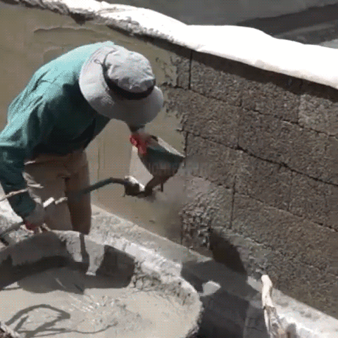 Stucco and Cement Sprayer being used on walls/construction sites